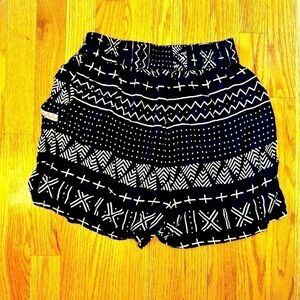 Fun & Flirt Black  Aztec patterned Boho shorts with pockets.​